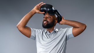 Putting on the HTC Vive Focus Vision