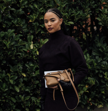 woman wearing sweater in paris 