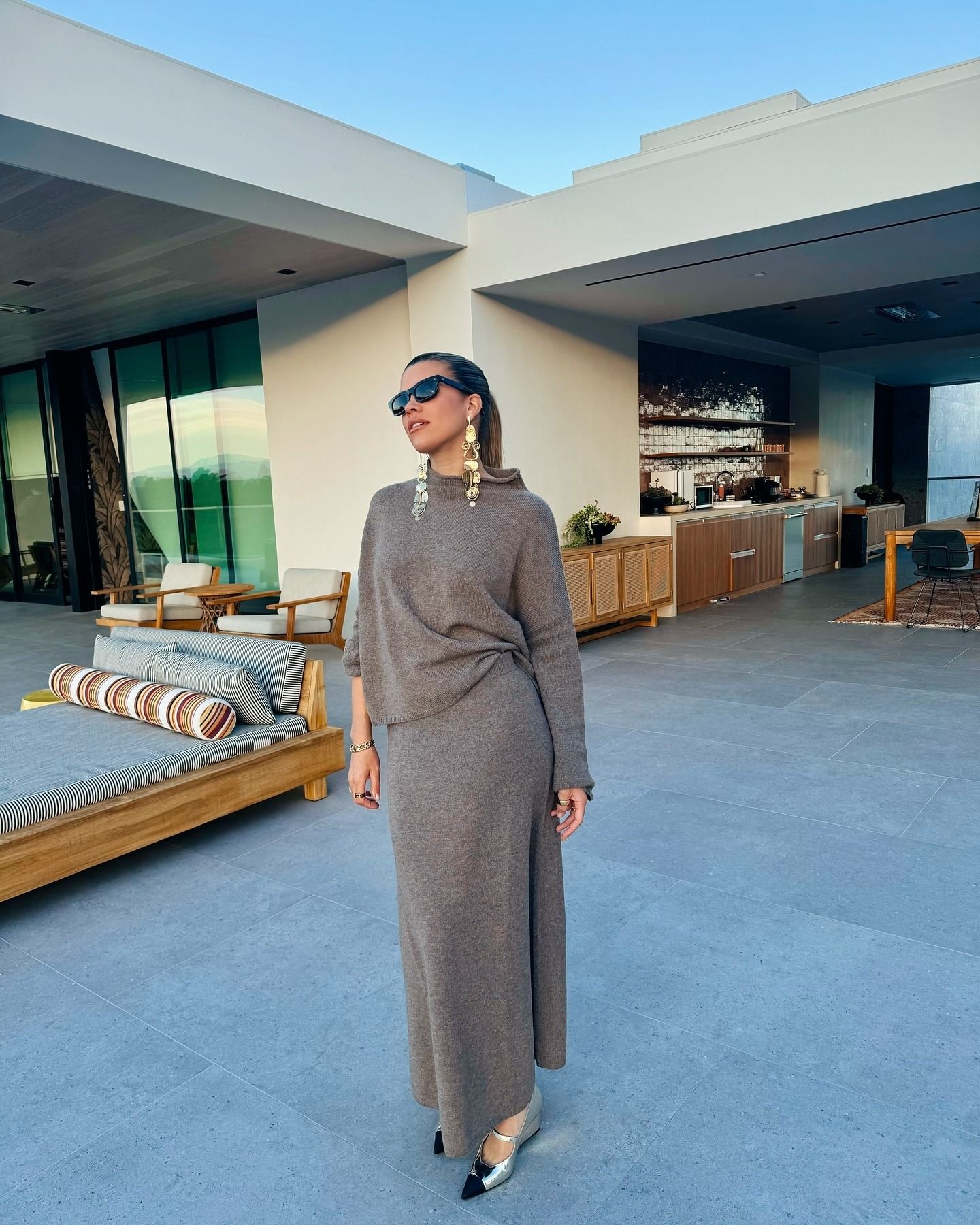 Sofia Richie wearing silver heels
