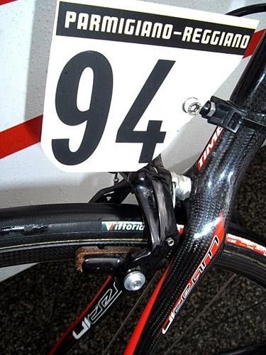 Note the novel way the Cofidis team mechanic mounts the race number on Duclos-Lasalle's bike. He's also testing prototype cork mix brake blocks from Campagnolo that are specifically designed for carbon fibre rims.