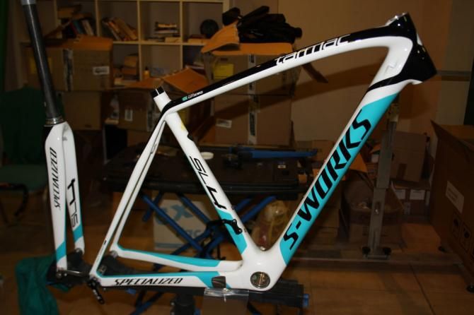 Alexey Lutsenko's road bike on the mechanic's stand