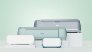 Cricut machines with a green background