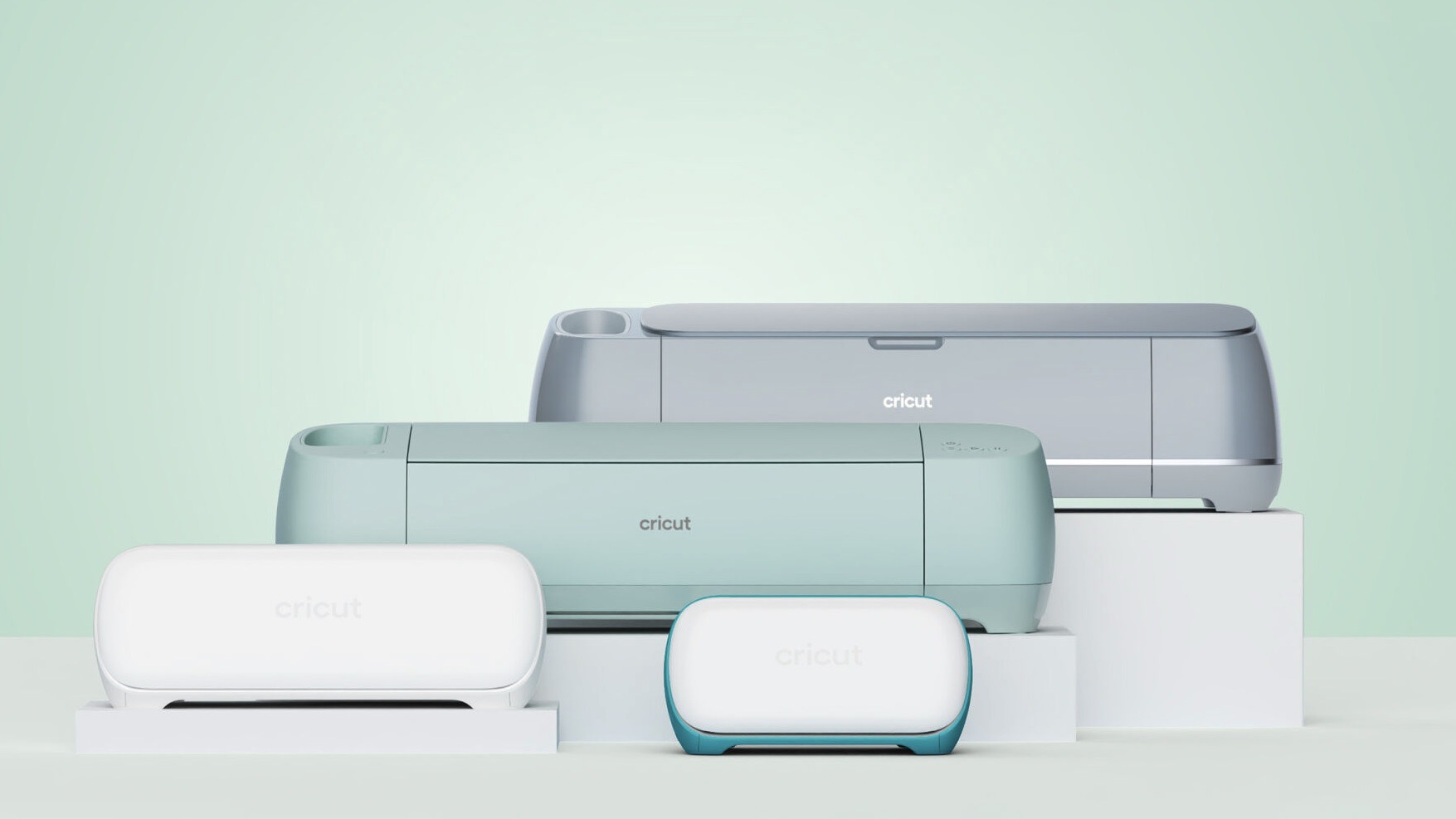 Cricut machines with a green background