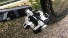 Image shows the Garmin Rally XC200 power meter pedals mounted on a gravel bike