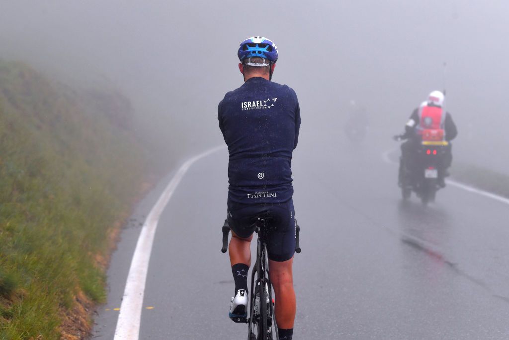 THYON 2000 LES COLLONS SWITZERLAND MAY 01 Mads Wurtz Schmidt of Denmark and Team Israel StartUp Nation dropped from the Breakaway during the 74th Tour De Romandie 2021 Stage 4 a 1613km stage from Sion to Thyon 2000 Les Collons 2076m Fog Rain TDR2021 TDRnonstop UCIworldtour on May 01 2021 in Thyon 2000 Les Collons Switzerland Photo by Luc ClaessenGetty Images