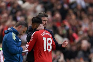 Man Utd duo Michael Carrick and Casemiro embrace at Old Trafford