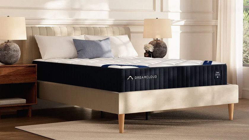 The DreamCloud Classic Memory Foam Mattress on a bed in a bedroom