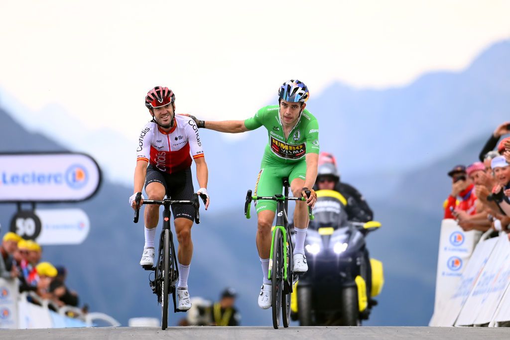 SERRE CHEVALIER FRANCE JULY 13 LR Ion Izagirre Insausti of Spain and Team Cofidis and Wout Van Aert of Belgium and Team Jumbo Visma Green Points Jersey react after the 109th Tour de France 2022 Stage 11 a 1517km stage from Albertville to Col de Granon Serre Chevalier 2404m TDF2022 WorldTour on July 13 2022 in Col de GranonSerre Chevalier France Photo by Tim de WaeleGetty Images