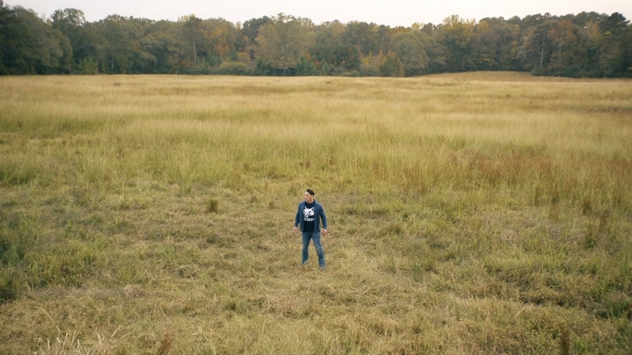Chris alone in the middle of a field on Salvation planet in Peacemaker Season 2 finale