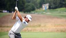 Cameron Young hits a hybrid