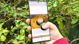 A Samsung Galaxy S23 Ultra using Image Clipper on a photo of a coffee cup
