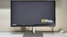The BenQ PD2730S monitor on a desk