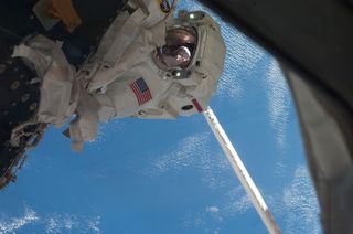 Fossum Spacewalk During STS-135