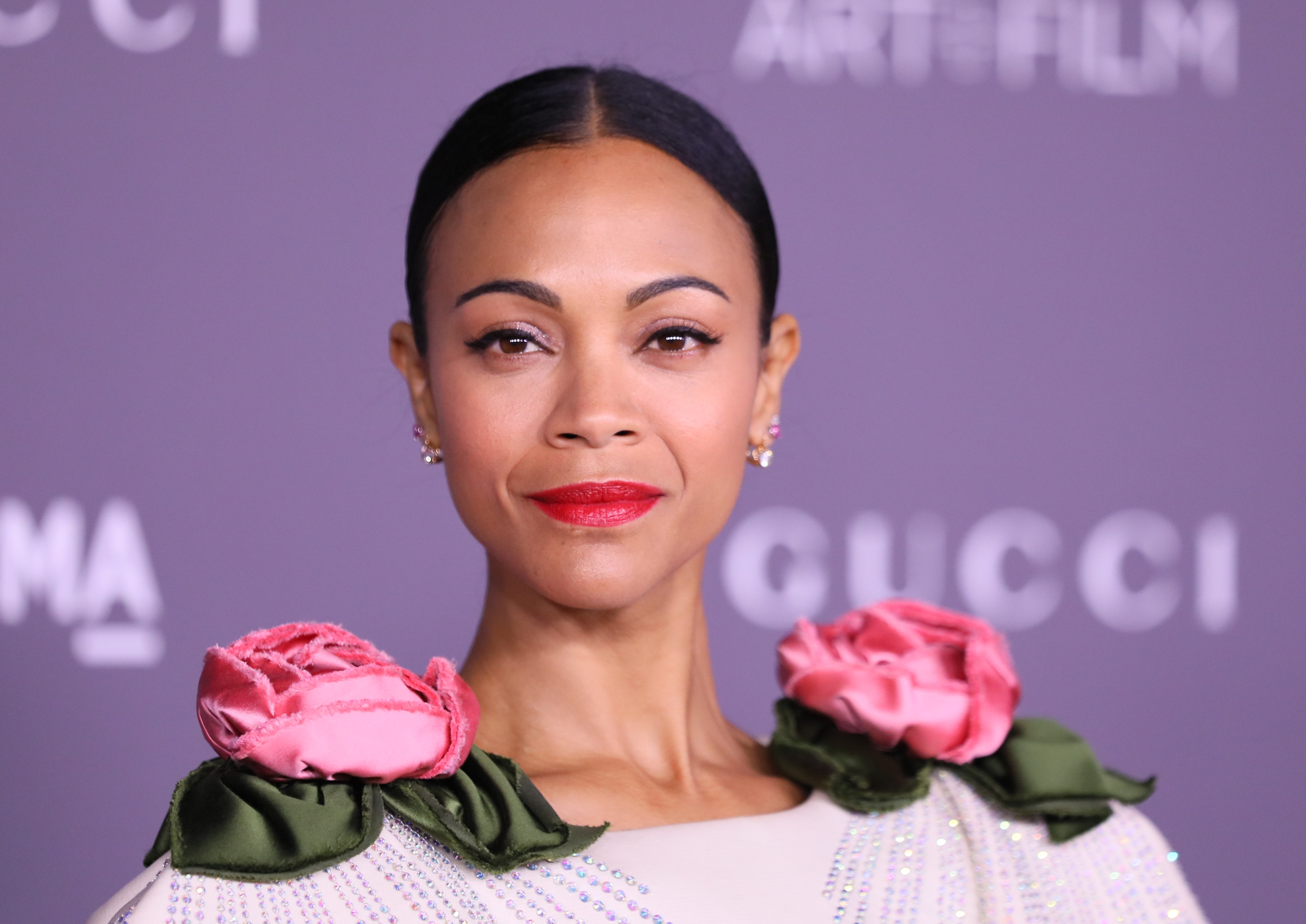Zoe Salda&amp;ntilde;a attending an event