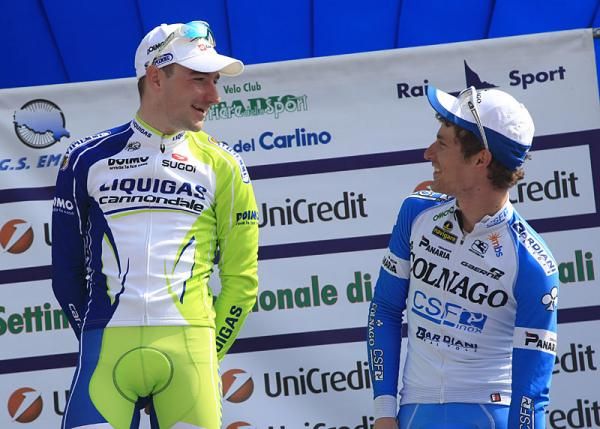 Elia Viviani (Liquigas - Cannondale) talks with Enrico Battaglin (Colnago - CSF) on the podium