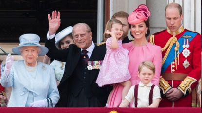 the Queen Elizabeth II, Prince Philip, Duke of Cambridge, Catherine, Duchess of Cambridge, Princess Charlotte of Cambridge, Prince George of Cambridge and Prince William, Duke of Cambridge look on from the balcony during the annual Trooping The Colour parade on June 17, 2017 