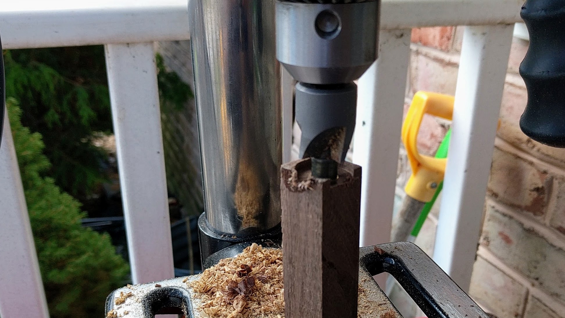 A drill press in action
