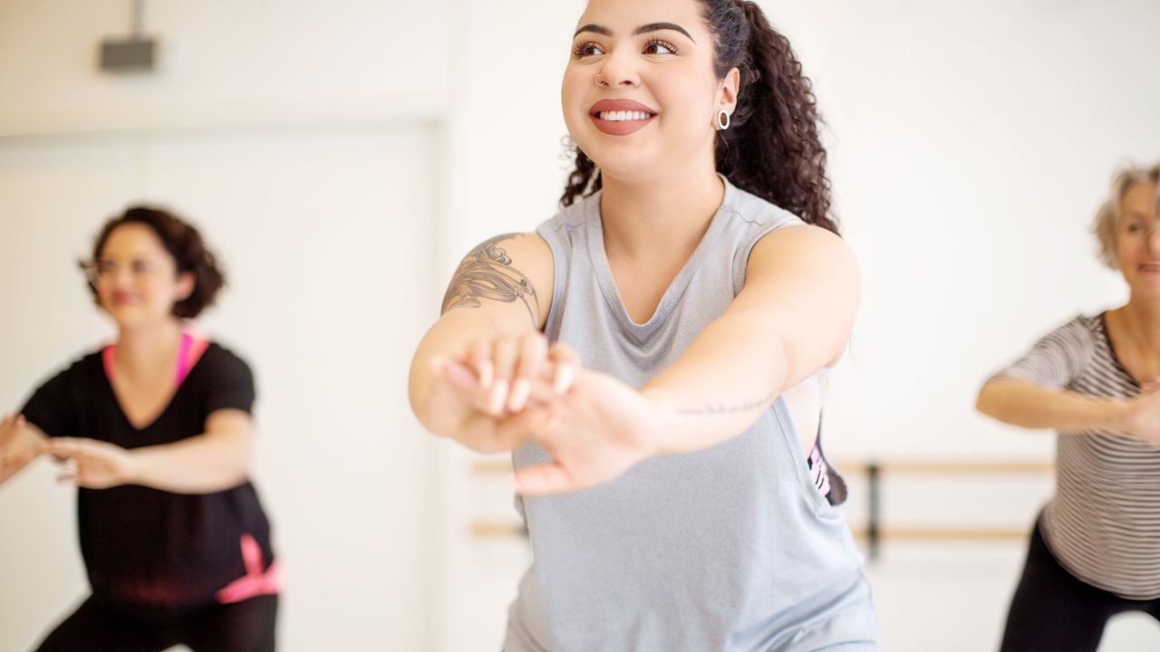 Women complete an indoor workout 