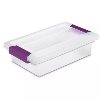 a clear storage tote with purple latches for closing