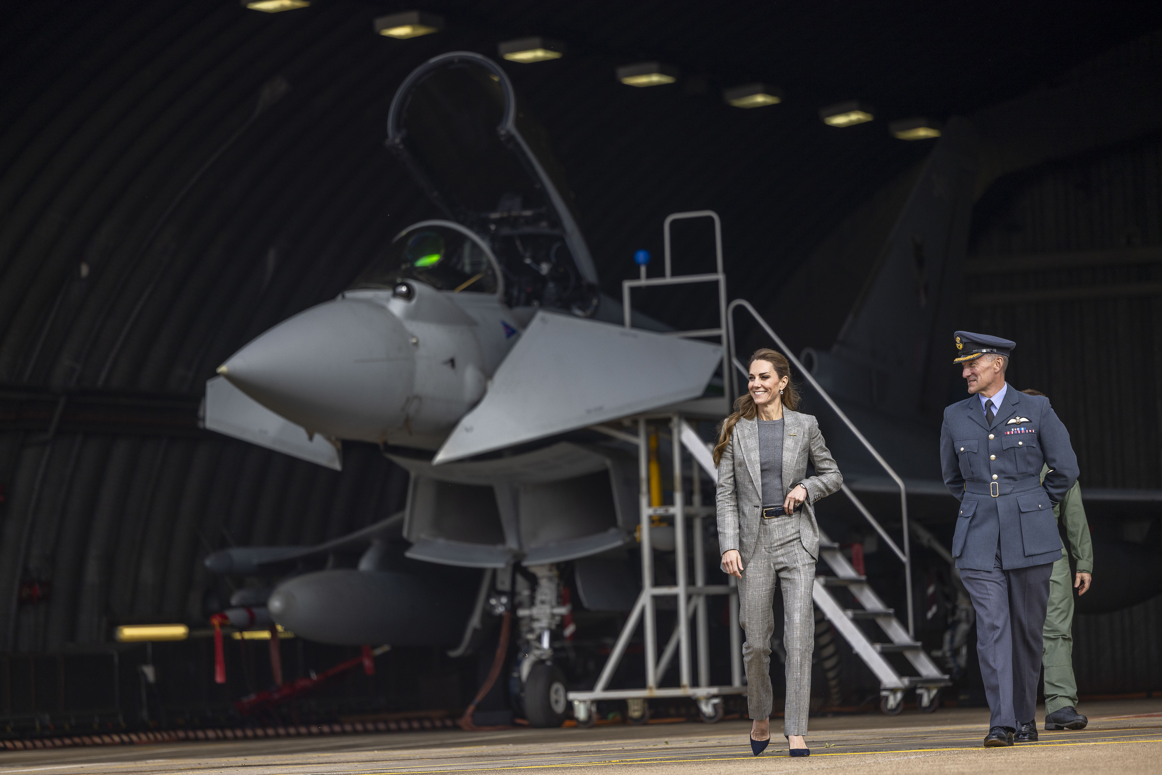 CONINGSBY, ENGLAND - OCTOBER 2: Catherine, Princess of Wales, Royal Honorary Air Commodore, is shown a Typhoon aircraft as she is given a tour of the new Typhoon Future Synthetic Training facility at RAF Coningsby in Lincolnshire during her first official engagement at the station, on October 2, 2025 in Coningsby, England. During the visit, Her Royal Highness learned about the station&#039;s operational role, met Quick Reaction Alert personnel, viewed a Typhoon aircraft, and toured the new Typhoon Future Synthetic Training facility, and also met families of personnel serving at the base. (Photo by James Glossop - WPA Pool/Getty Images)