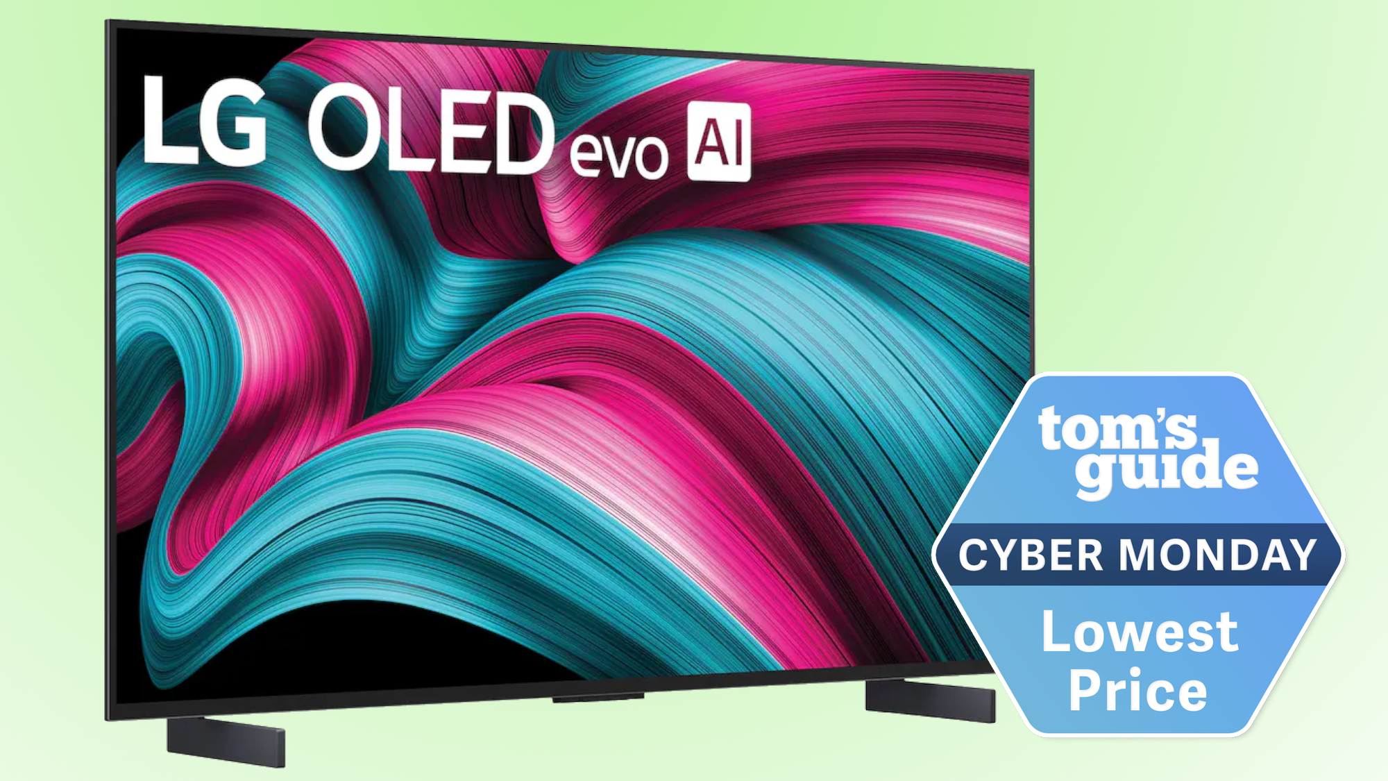 The 42-inch LG C5 OLED TV displaying an abstract image. Next to the TV is a badge that reads: &quot;Tom&#039;s Guide Cyber Monday Lowest Price&quot;.