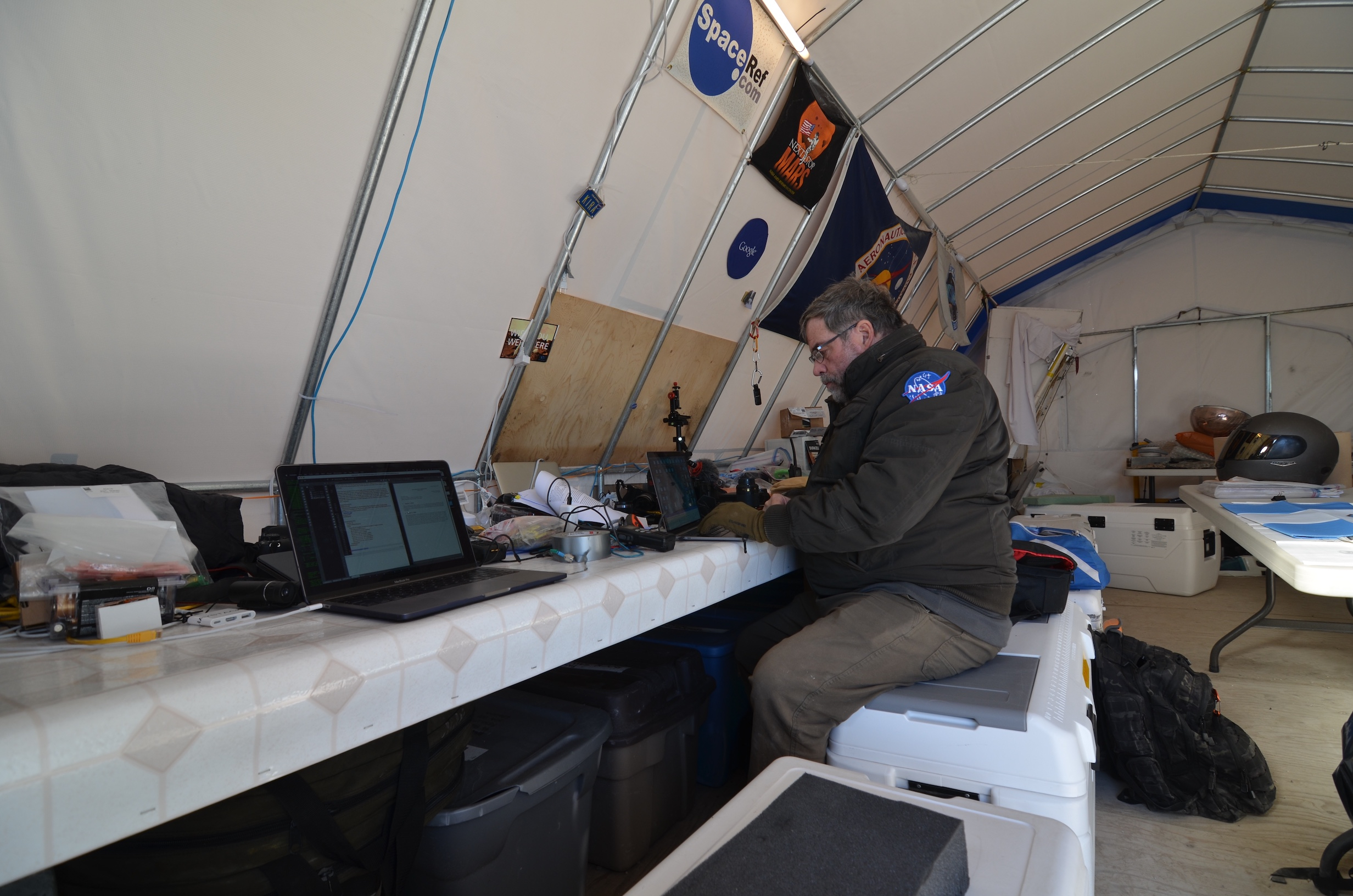 Downtime is an opportunity to catch up on work. Rod Pyle writes in the office tent