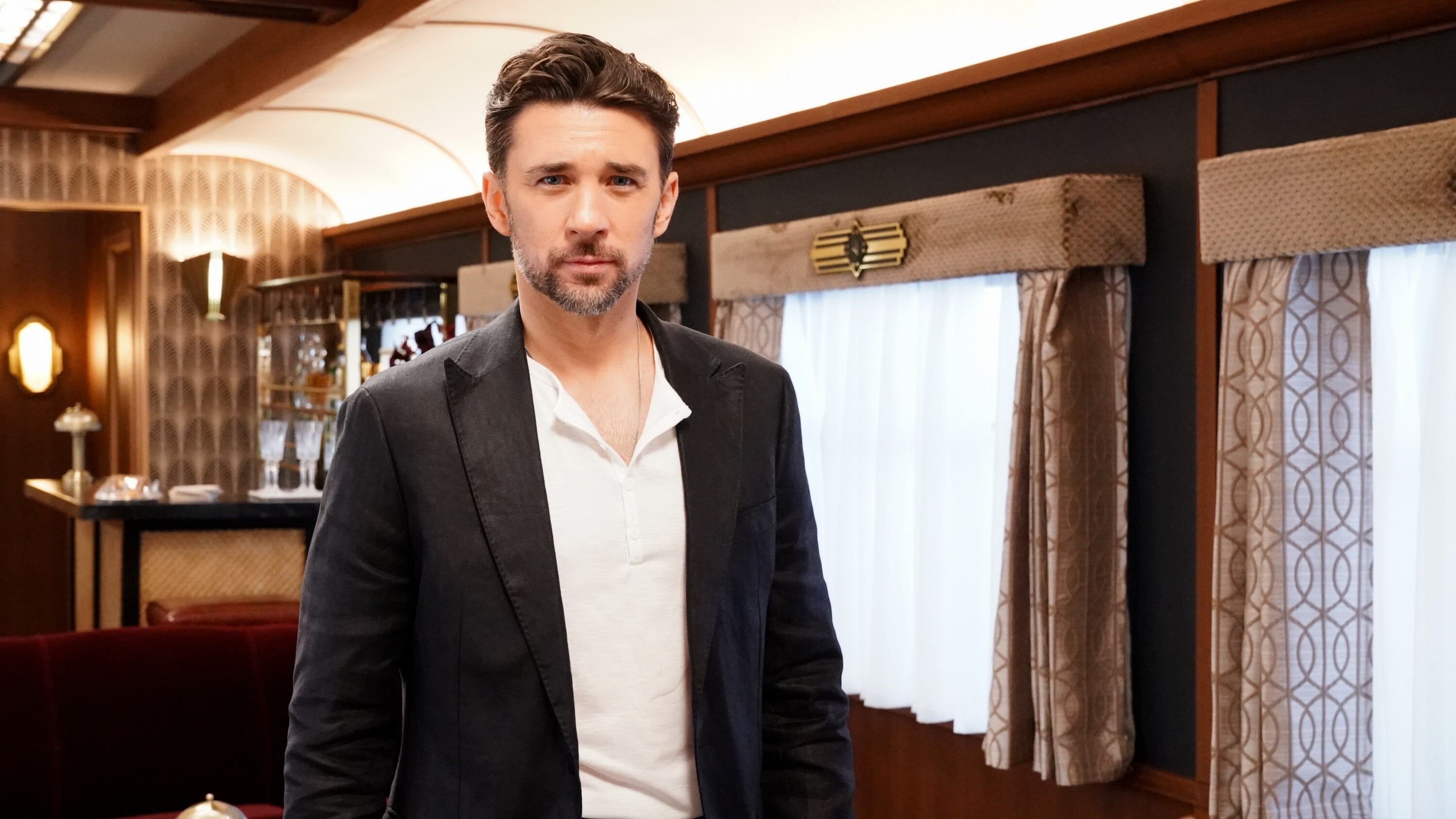 Billy Flynn as Cane Ashby on a train in The Young and the Restless