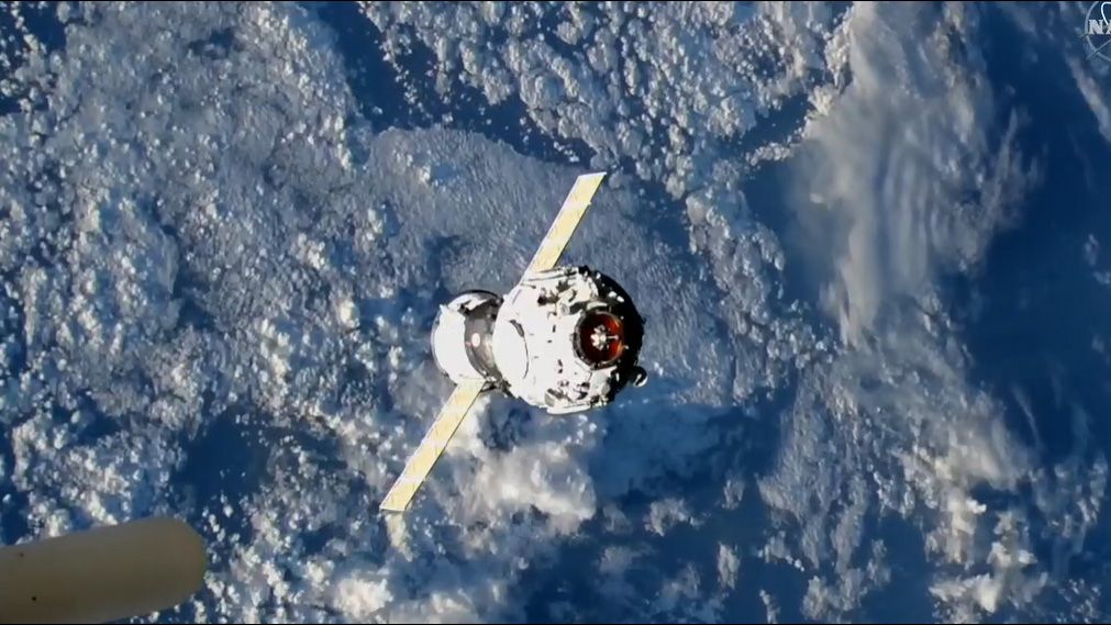 The New Russian Prichal module approaching the International Space Station.