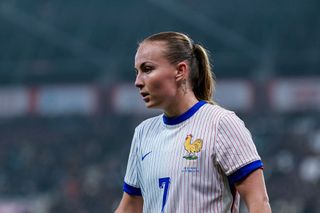 Julie Dufour of France walks in the field during the Women's International Friendly match between Switzerland and France at Stade de Geneve on October 29, 2024 in Geneva, Switzerland.