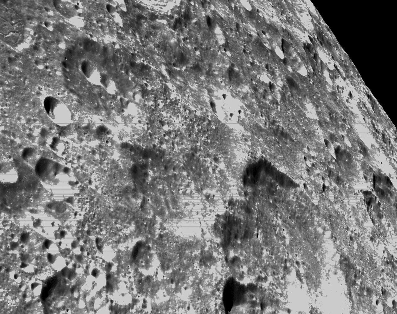 Close-up view of the lunar surface captured by the Orion spacecraft's onboard optical navigation camera during the mission's closest approach to the lunar surface on Nov. 21, 2022.