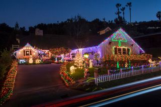 People in self-isolation are putting Christmas lights up to spread cheer