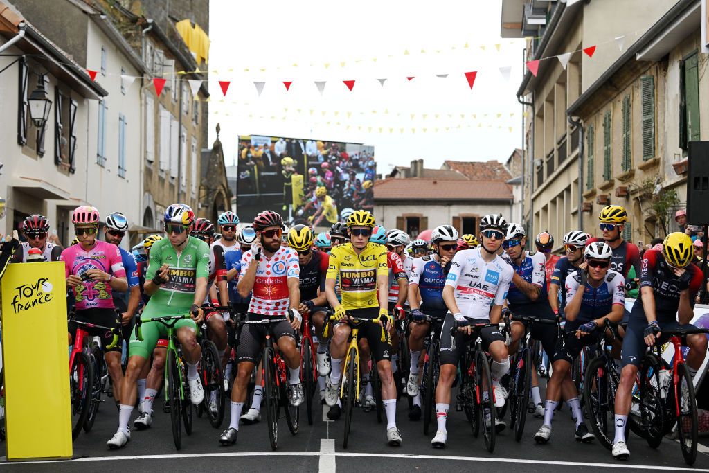 CAHORS FRANCE JULY 22 LR Neilson Powless of United States and Team EF Education Easypost Wout Van Aert of Belgium and Team Jumbo Visma Green Points Jersey Simon Geschke of Germany and Team Cofidis Polka Dot Mountain Jersey Jonas Vingegaard Rasmussen of Denmark and Team Jumbo Visma Yellow Leader Jersey and Tadej Pogacar of Slovenia and UAE Team Emirates white best young jersey prior to the 109th Tour de France 2022 Stage 19 a 1883km stage from CastelnauMagnoac to Cahors TDF2022 WorldTour on July 22 2022 in Cahors France Photo by Dario BelingheriGetty Images