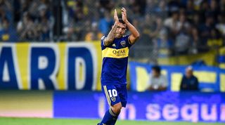 Carlos Tevez applauds the Boca Juniors fans.