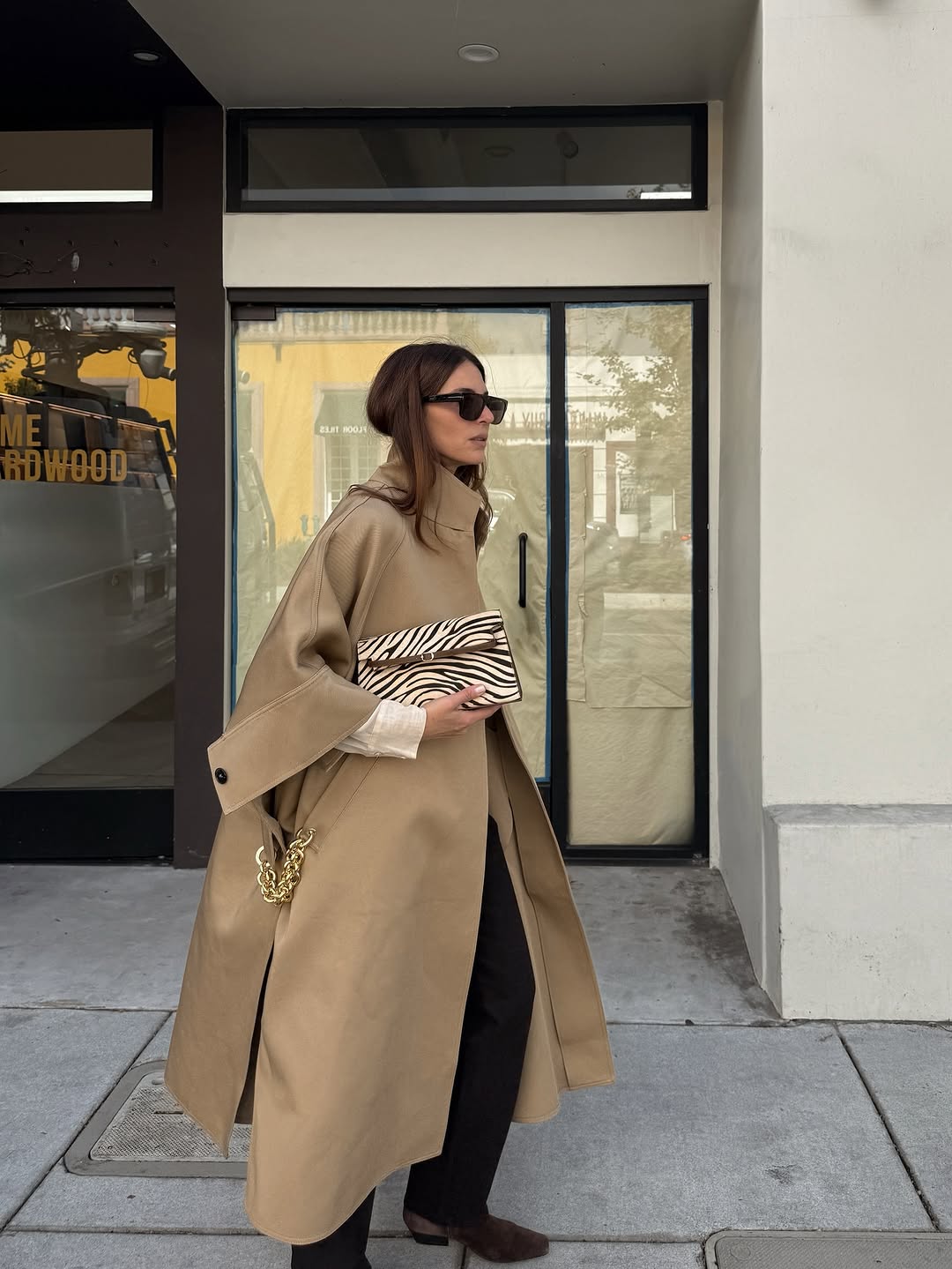 woman wearing suede pointed toe ankle boots trend 2025