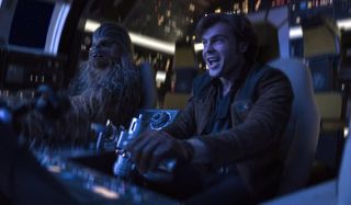 Solo: A Star Wars Story Han and Chewie piloting the Falcon excitedly