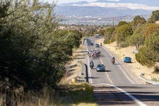 Men's Pro peloton rolls north out out of Silver City headed up to the first KOM in Pinos Altos.