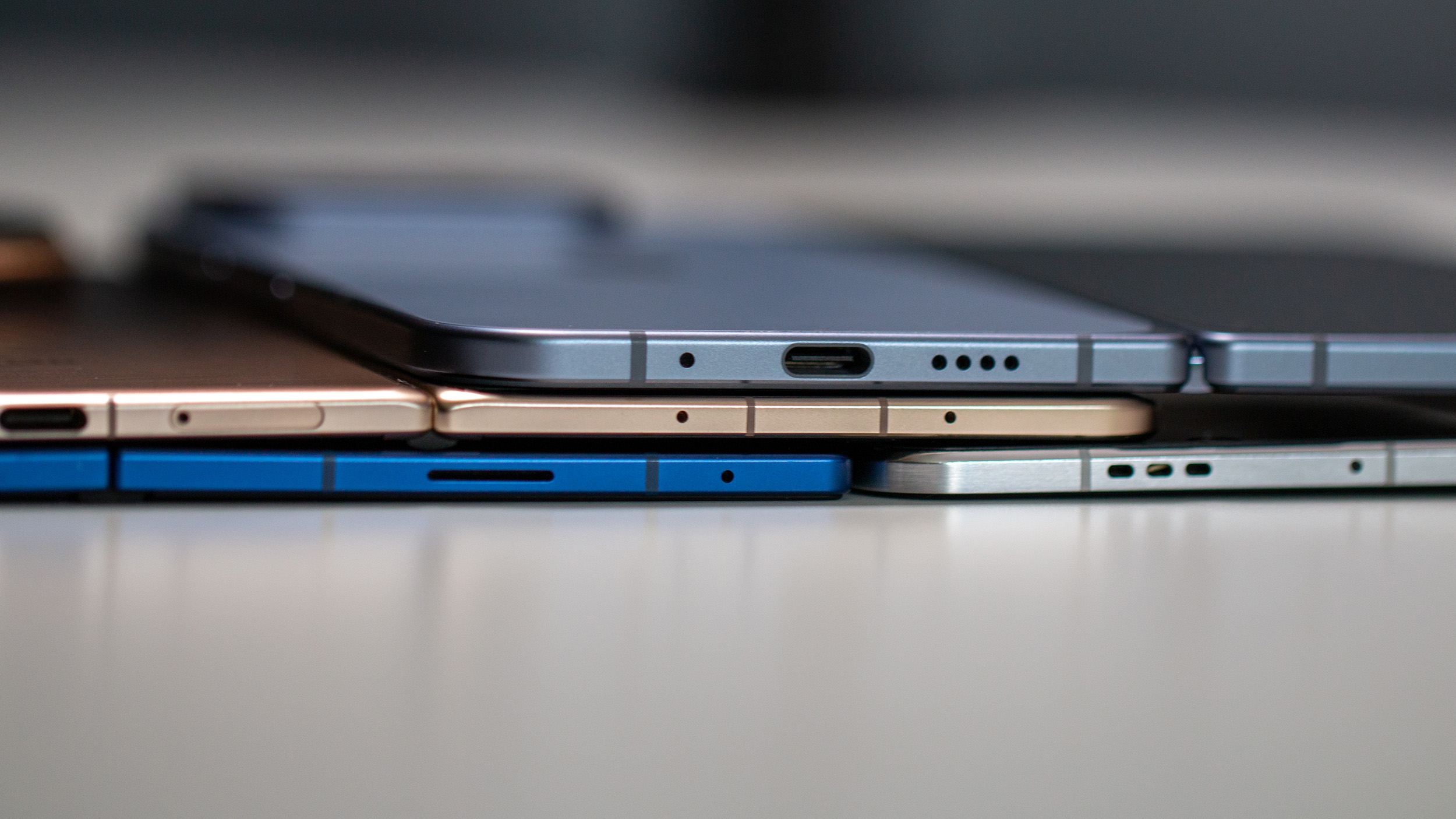Pixel 10 Pro Fold, Honor Magic V5, Samsung Galaxy Z Fold 7, Oppo Find N5 lying face down on desk