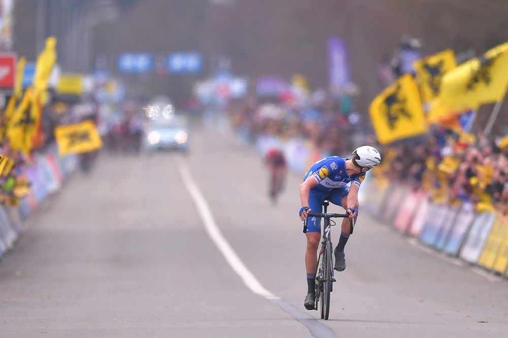 Niki Terpstra (Quick-Step Floors) checks his gap on the way to winning Tour of Flanders