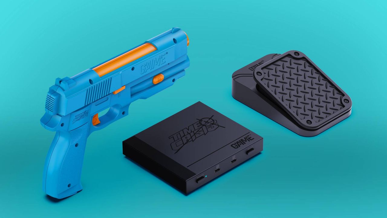 Blue G'aim'e Time Crisis bundle with gun, peddle, and main box on blue backdrop.