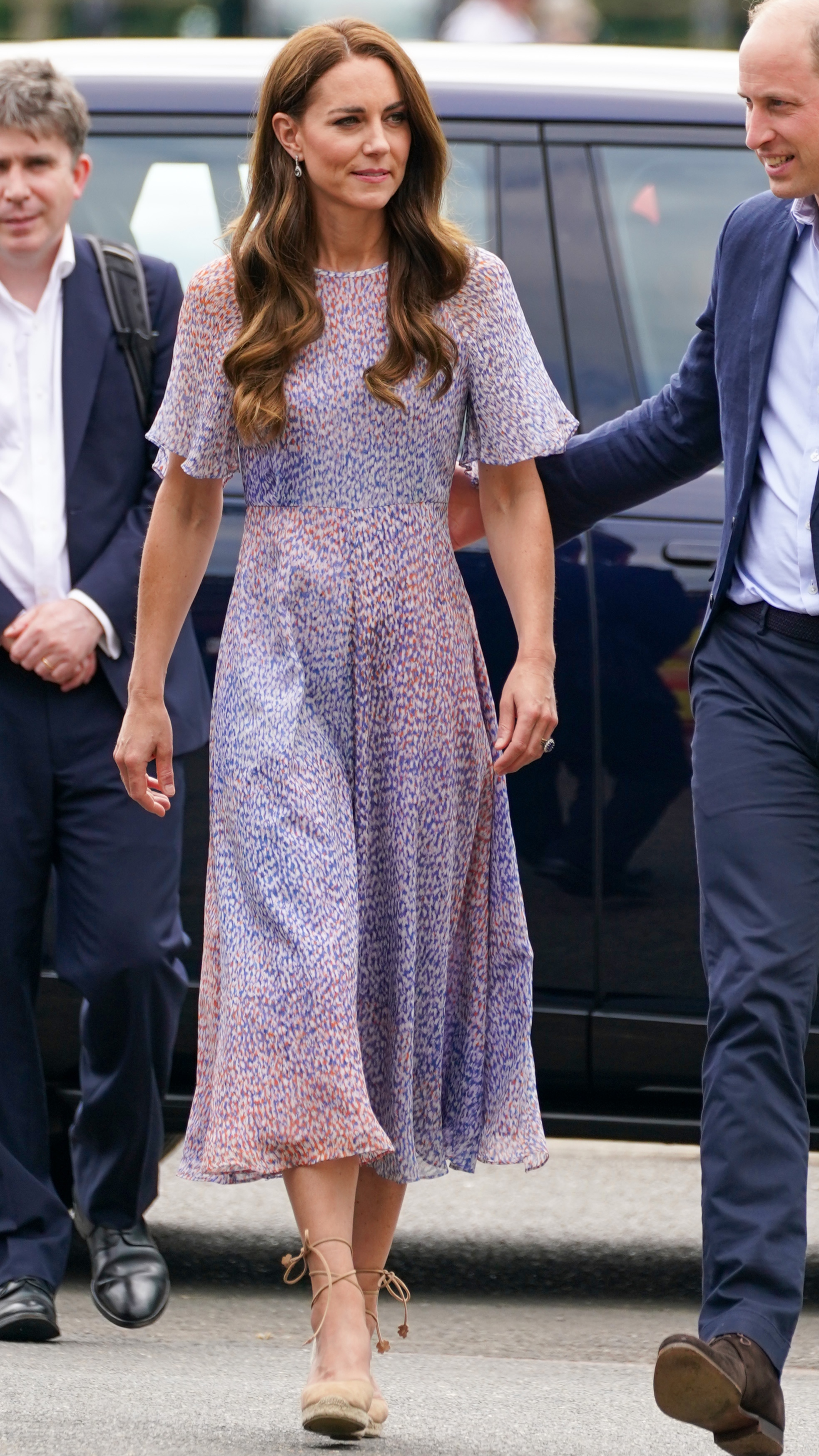 Catherine, Princess of Wales walks as she attends Cambridgeshire County Day at Newmarket Racecourse