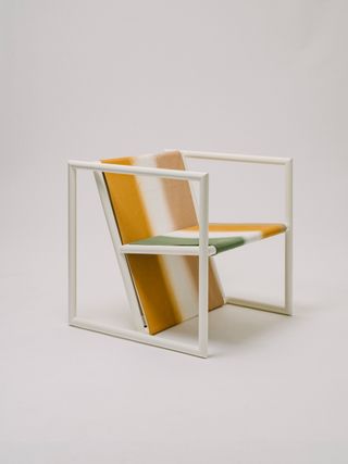 Chair by Jonathan Saunders featuring framed structure with textile seat