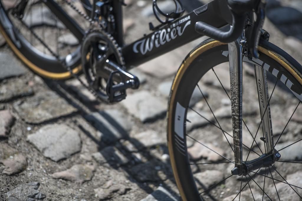 The chrome wrap has cobbles on the outside and Wilier decals on the inside of the forks