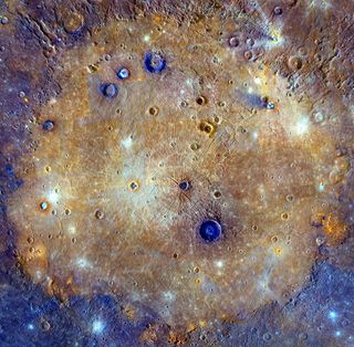 This enhanced-color composite full view taken by the MESSENGER spacecraft in 2014 showcases Caloris Basin on Mercury. Balanchine crater is visible in the top right of the basin.