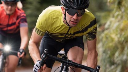 Male cyclist wearing Altura bibshorts and other clothing