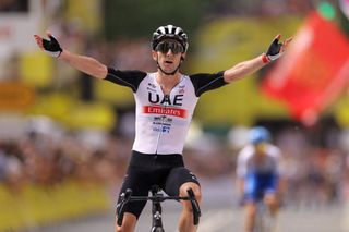 UAE Team Emirates British rider Adam Yates cycles to the finish line to win the 1st stage of the 110th edition of the Tour de France cycling race 182 km departing and finishing in Bilbao in northern Spain on July 1 2023 Photo by Thomas SAMSON AFP Photo by THOMAS SAMSONAFP via Getty Images