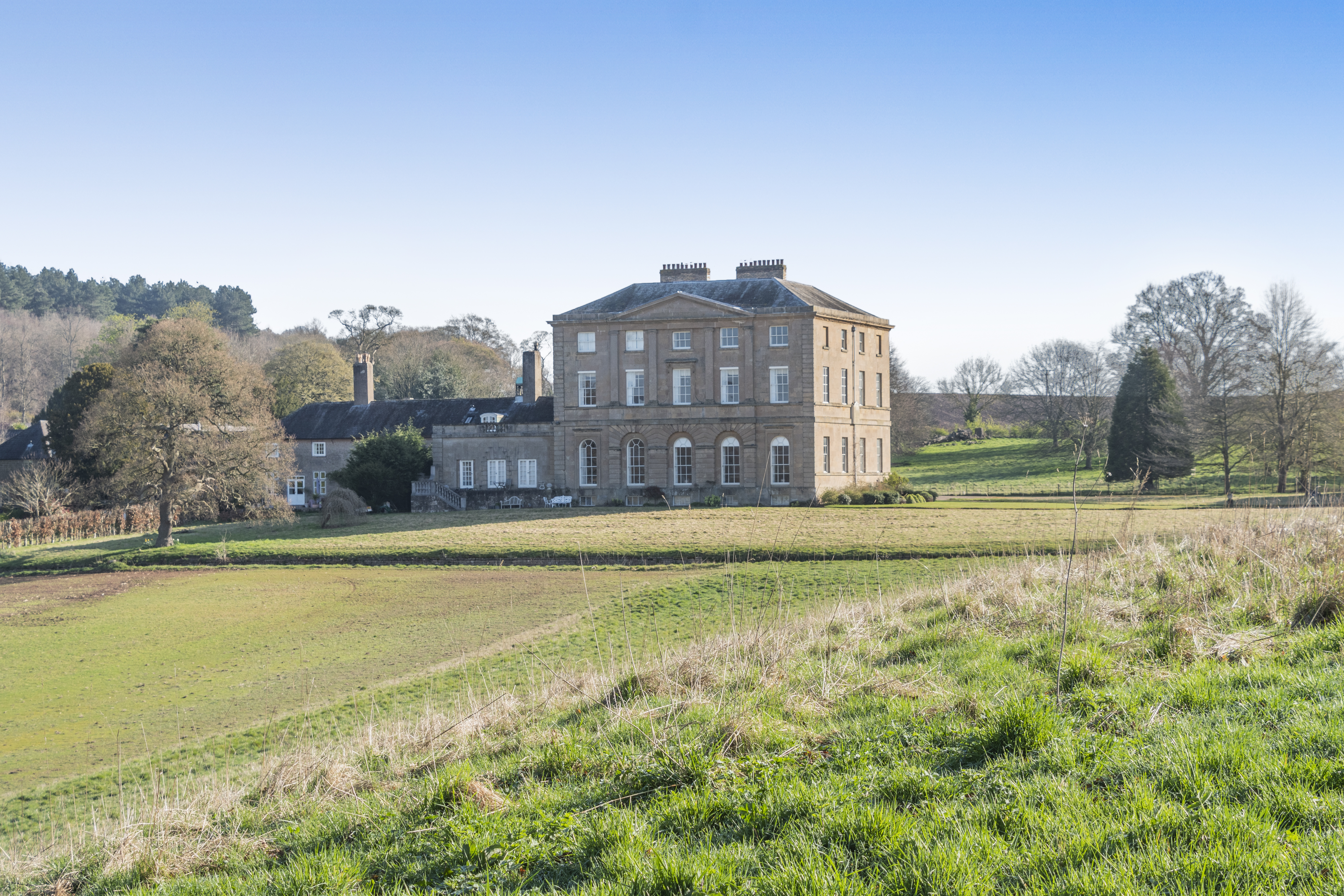 A grand Georgian house set in acres of grassland