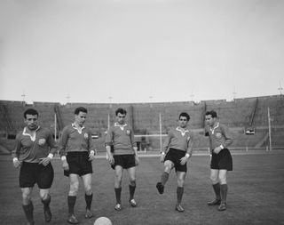 Bulgaria football players train ahead of their preliminary match against Great Britain ahead of the 1956 Olympics.