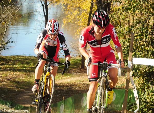 Crystal Anthony (Cyclocrossworld.com) leading Mical Dyck up from the river