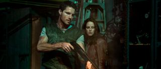 Robbie Amell and Kaya Scodelario in Resident Evil: Welcome To Raccoon City