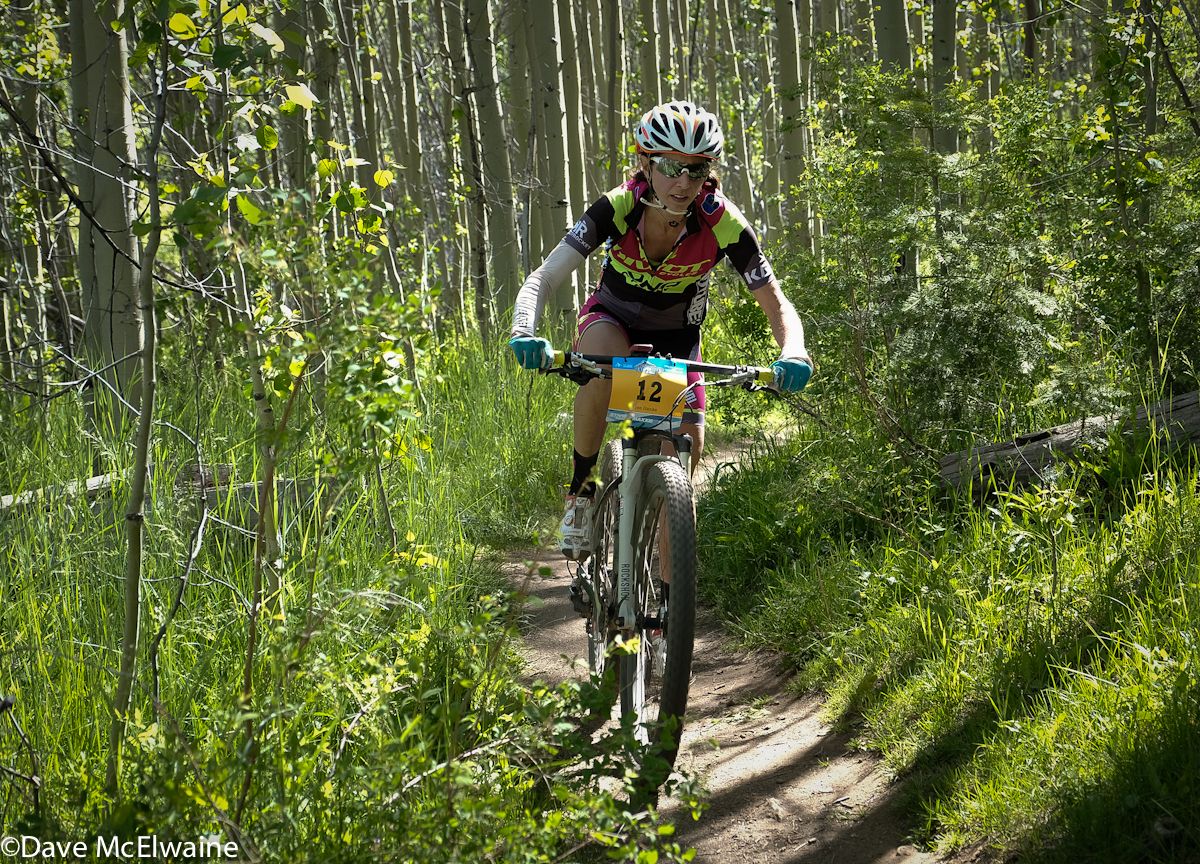 Jen Hanks (Pivot Cycles) riding through one of the many aspen groves